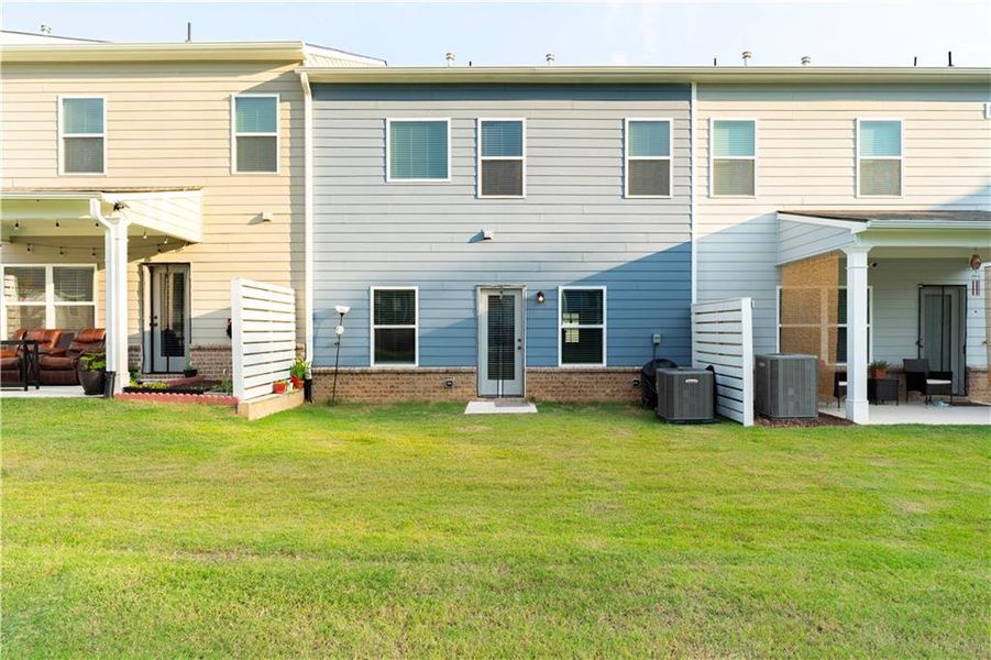 Front exterior of a new home in Ellison Square, Sugar Hill, GA, highlighting curb appeal (Image 19).