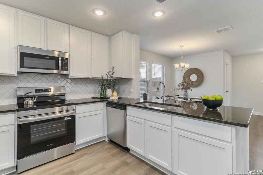 Furnished interior view inside a new home in Katzer Ranch, Converse (Image 10). Furnished interior view inside a new home in Katzer Ranch, Converse (Image 10).