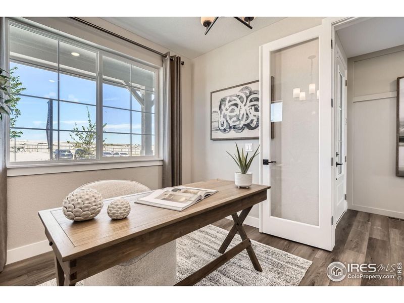 First floor office *Photo not of actual home, but same floorplan and style*