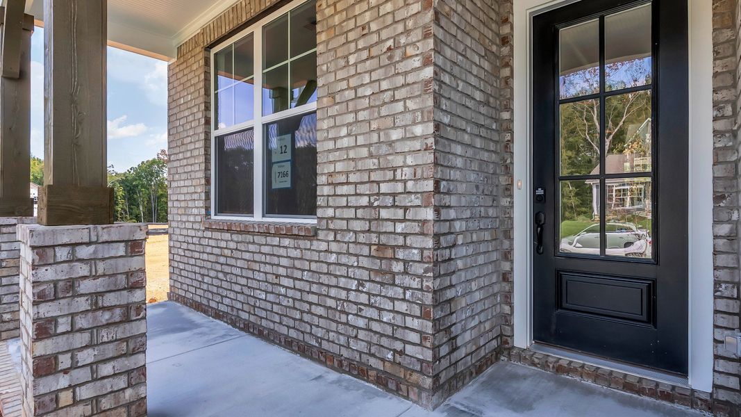 Exterior details and patio area of a home in Brush Creek, Fairview (Image 4).