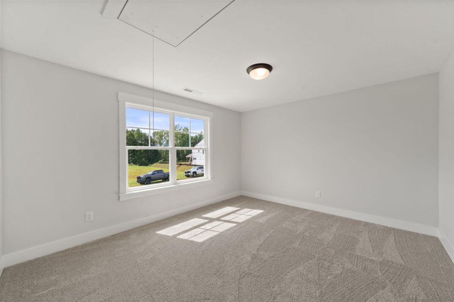 Spacious, unfurnished interior of a new home in Fiddler's Ridge, Advance (Image 26).