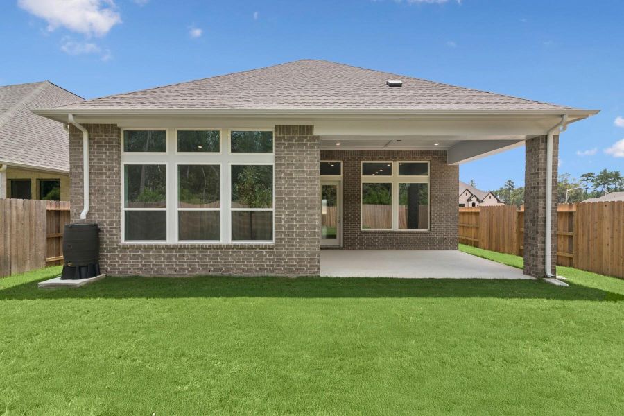 Exterior details and patio area of a home in ARTAVIA 45' Homesites, Conroe (Image 24).