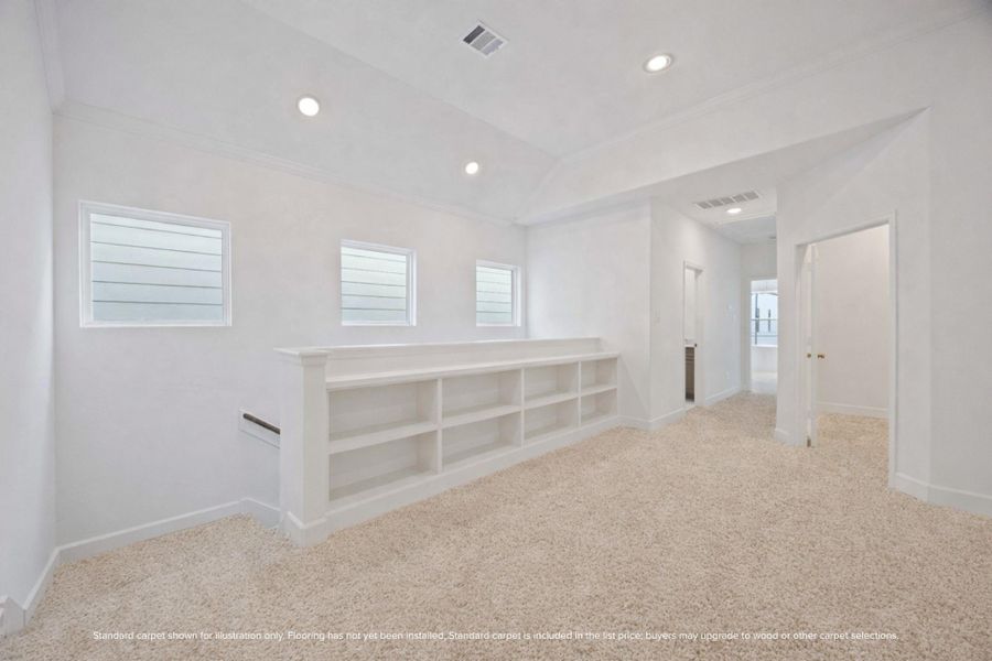 Upstairs game room ready for movie nights, a play zone, or your future media setup.