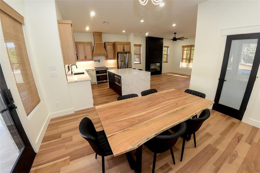 Dining space with chandelier.