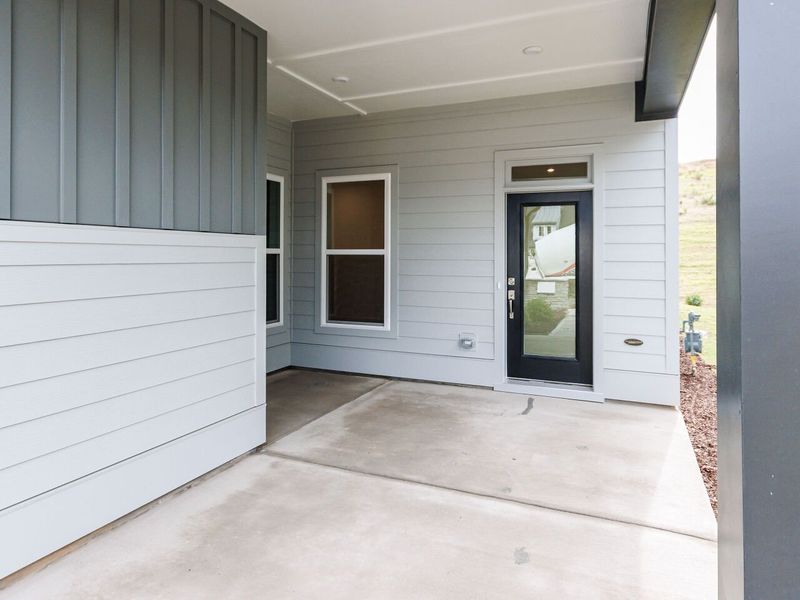 Exterior details and patio area of a home in Encore at Chatham Park – Villa Series, Pittsboro (Image 4).
