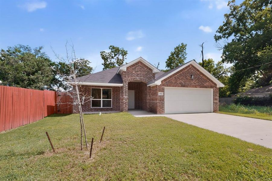 Front exterior of a new home in , Greenville, TX, highlighting curb appeal (Image 20). Front exterior of a new home in , Greenville, TX, highlighting curb appeal (Image 20).