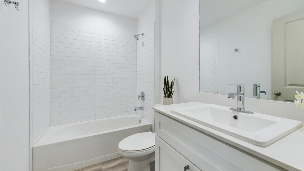 Representative furnished interior of a home built from the The Lakeway by D.R. Horton in Abbey Glen, Lubbock (Image 5).