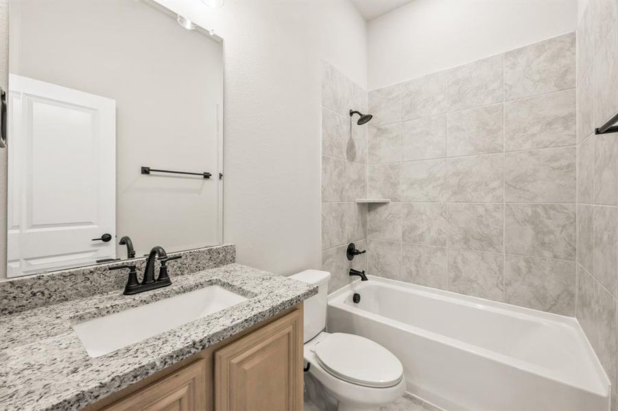 Furnished interior view inside a new home in Mockingbird Hills 60-65, Joshua (Image 8).