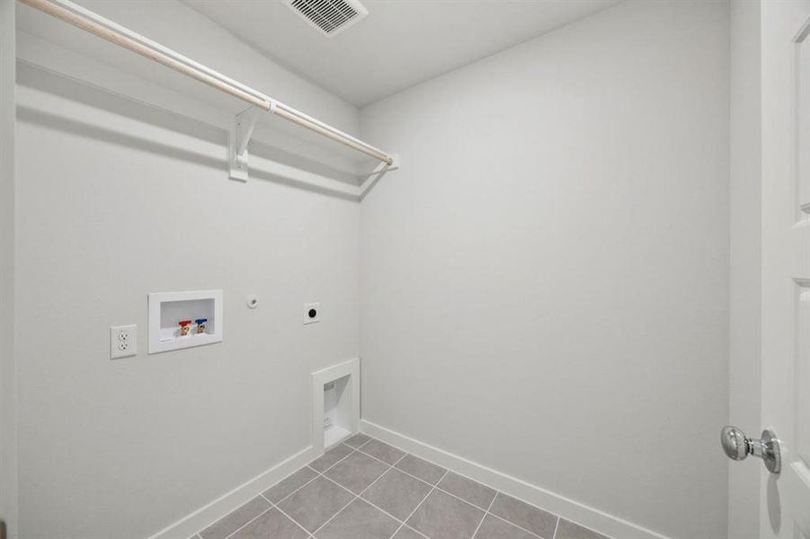 Utility Room in the Hadley home plan by Trophy Signature Homes – REPRESENTATIVE PHOTO