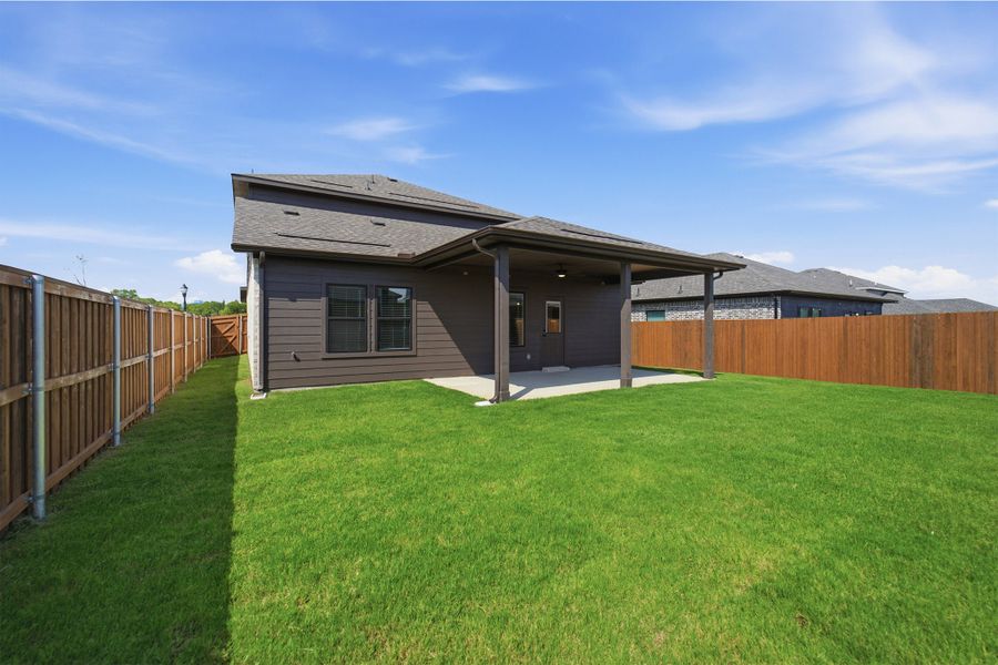 Exterior details and patio area of a home in Heartland, Crandall (Image 21).