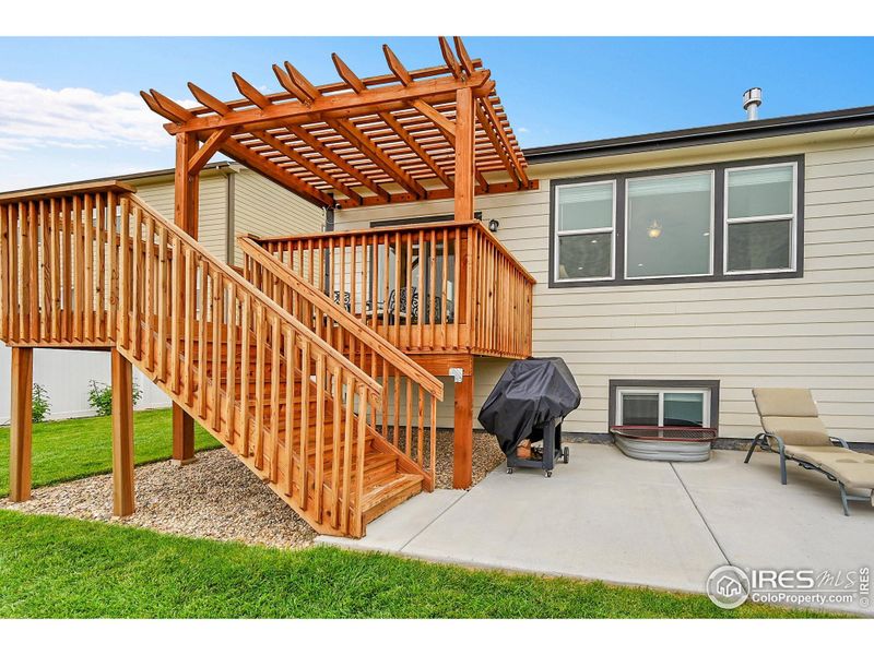 Pergola and Back Deck with Stairs to the Backyard