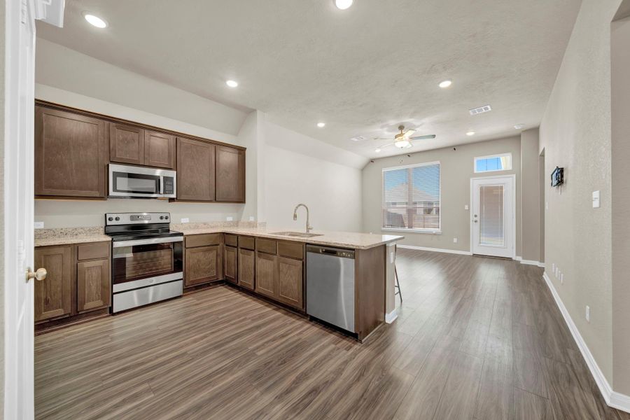 Open concept kitchen and living space Open concept kitchen and living space