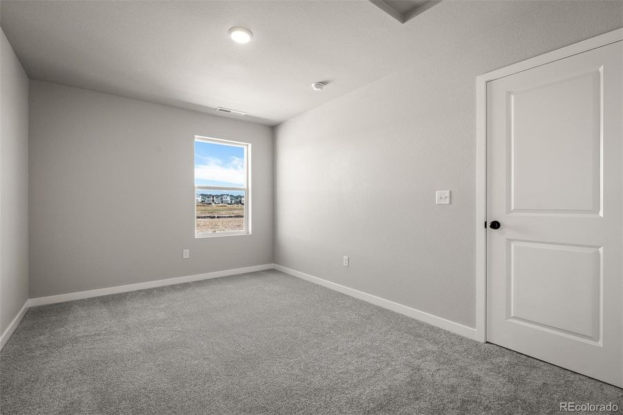 Spacious, unfurnished interior of a new home in Revel Crossing at Wolf Ranch – The Ascent Collection, Colorado Springs (Image 22).