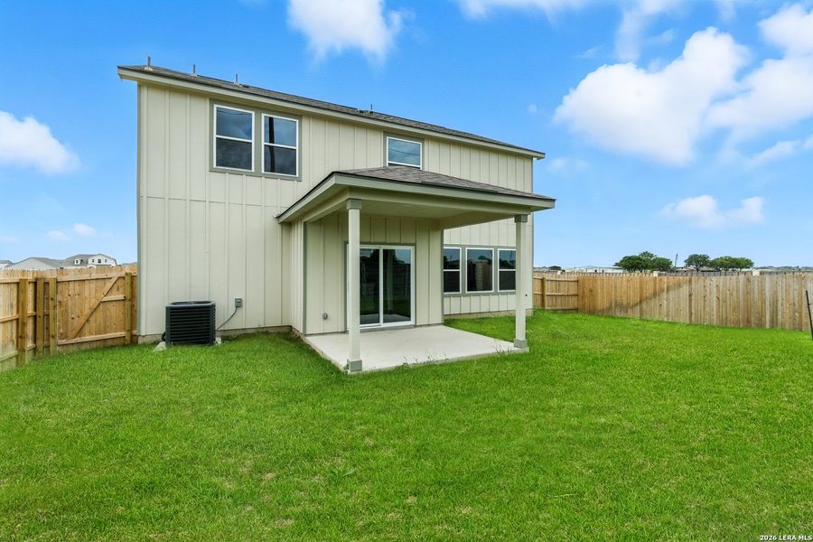 Exterior details and patio area of a home in Weltner Farms 50’s, New Braunfels (Image 4).
