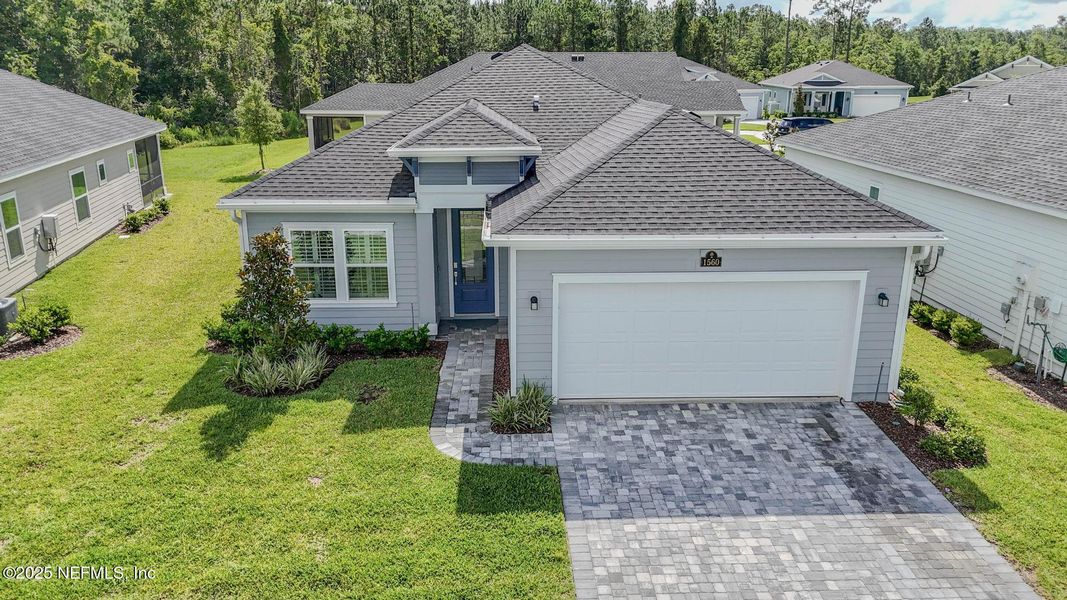 Front exterior of a new home in Stillwater | Active Adult 55+: Stillwater (50s) - Royal Collection, St. Johns, FL, highlighting curb appeal (Image 2). Front exterior of a new home in Stillwater | Active Adult 55+: Stillwater (50s) - Royal Collection, St. Johns, FL, highlighting curb appeal (Image 2).