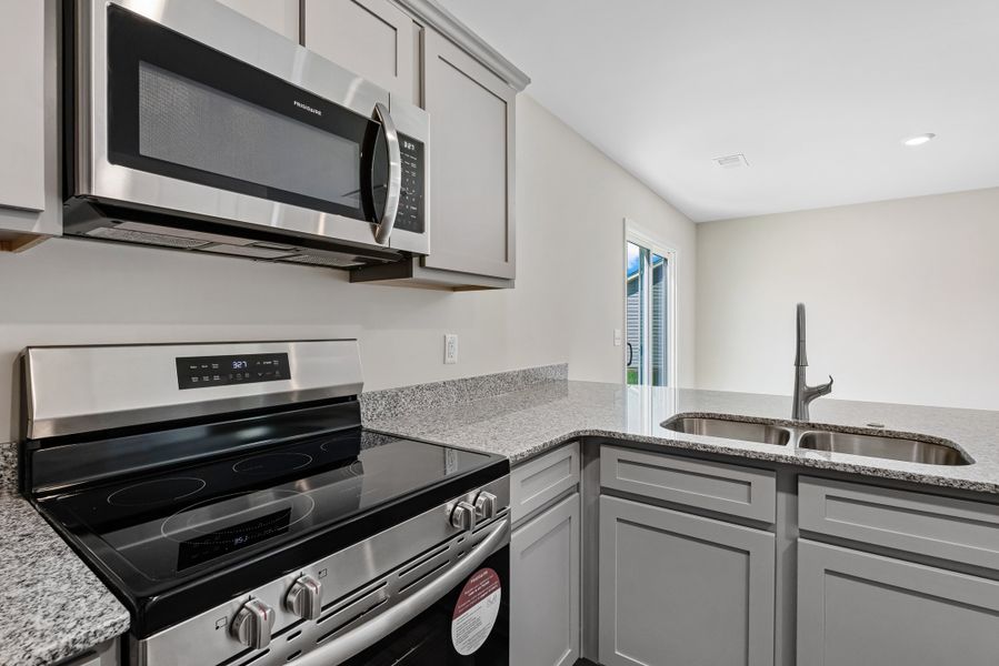 Representative furnished interior of a home built from the Poplar B by McGuinn Homes in Reserve at Mill Creek, Columbia (Image 18).