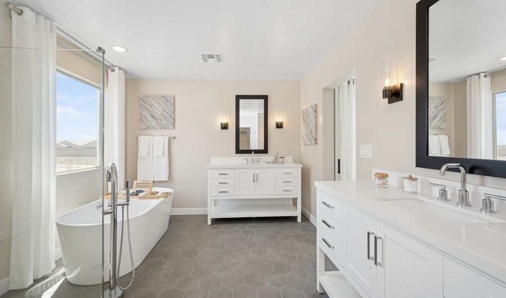 Primary bath with dual vanities and freestanding tub