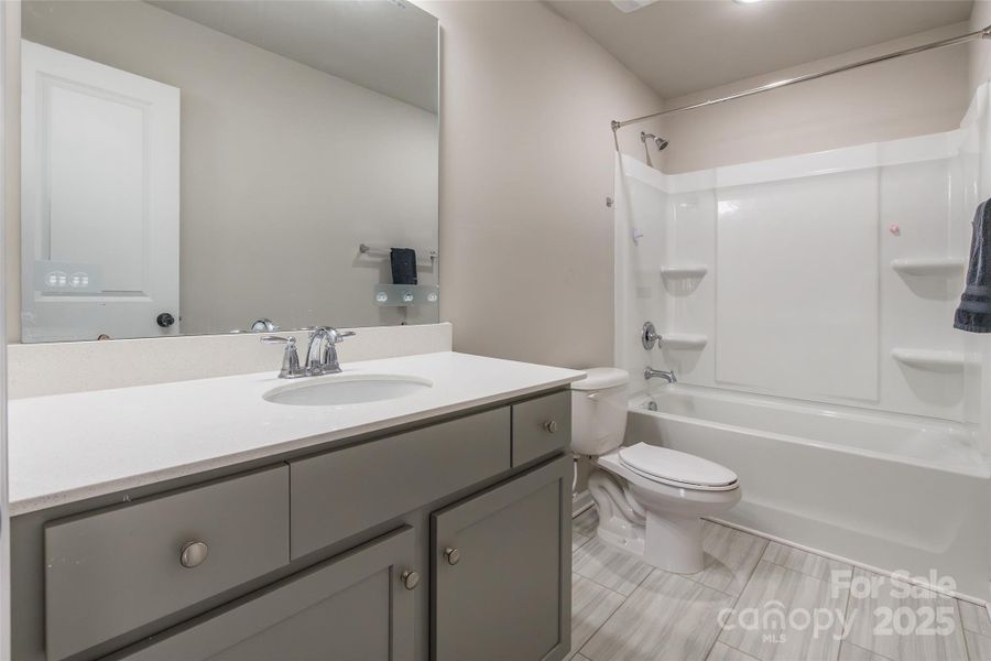 Furnished interior view inside a new home in McGee Place, Charlotte (Image 9).