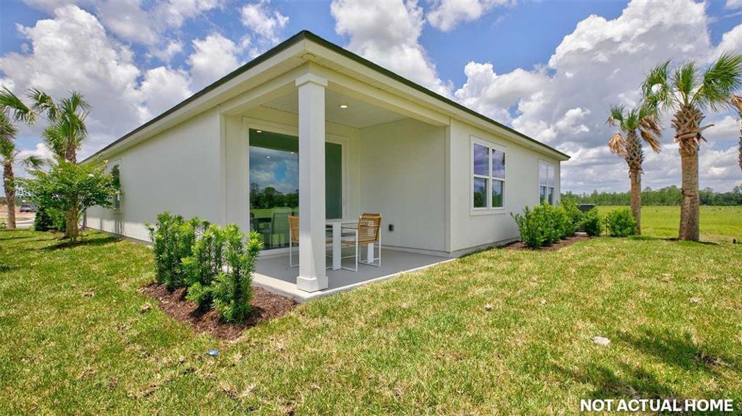Exterior details and patio area of a home in Sawmill Branch, Palm Coast (Image 22).