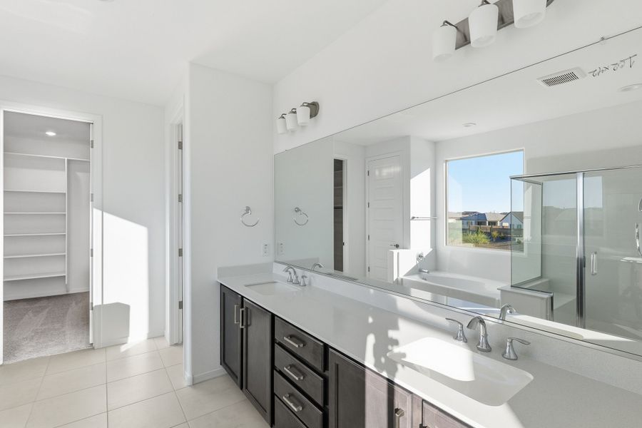 Representative furnished interior of a home built from the Triumph by Taylor Morrison in Artisan at Asante Encore Collection, Surprise (Image 10). Representative furnished interior of a home built from the Triumph by Taylor Morrison in Artisan at Asante Encore Collection, Surprise (Image 10).