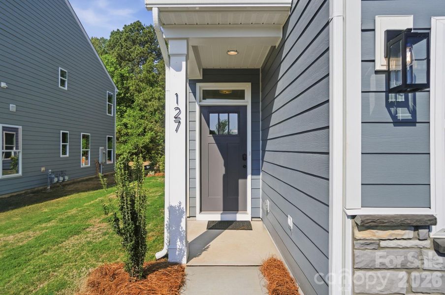 Exterior details and patio area of a home in Blythe Mill Townhomes, Waxhaw (Image 3). Exterior details and patio area of a home in Blythe Mill Townhomes, Waxhaw (Image 3).