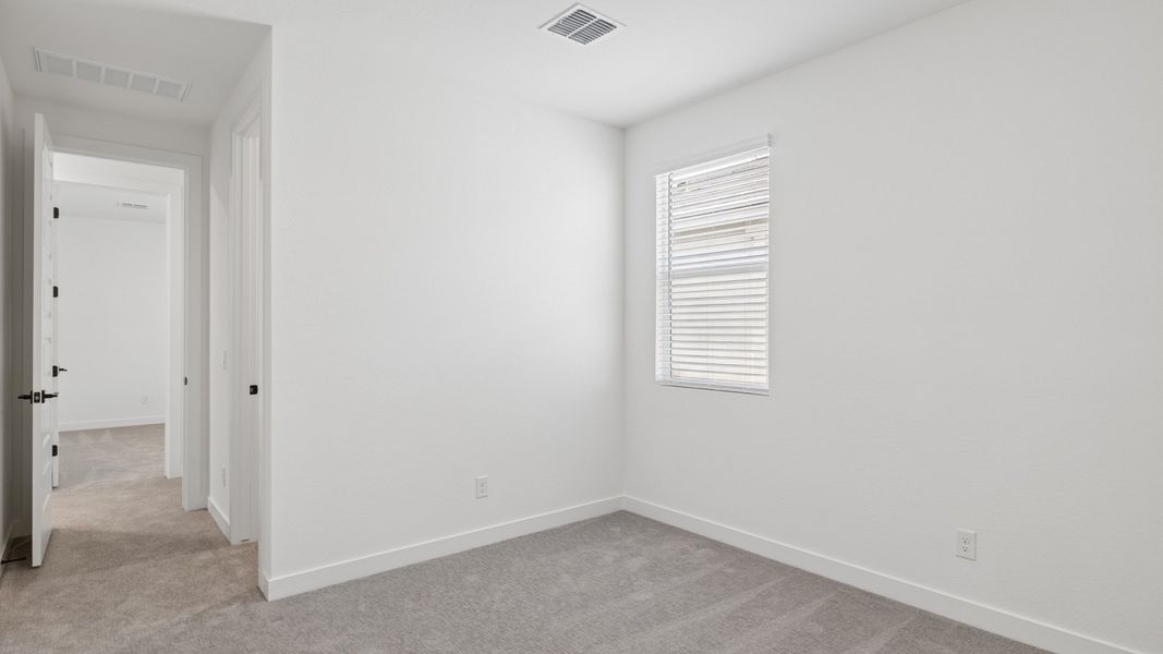 Representative unfurnished interior of a home built from the Phoenician by D.R. Horton in The Ridge at Stone Butte, Phoenix (Image 38).