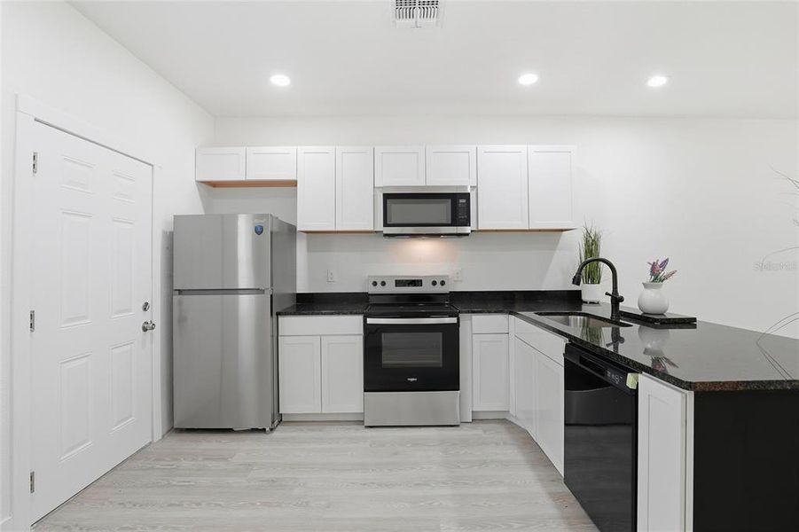 Furnished interior view inside a new home in , Interlachen (Image 12).