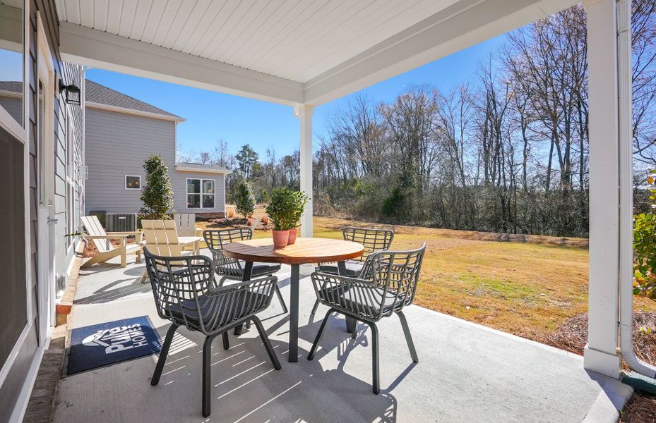 Exterior details and patio area of a home in Riverstone, Monroe (Image 4).