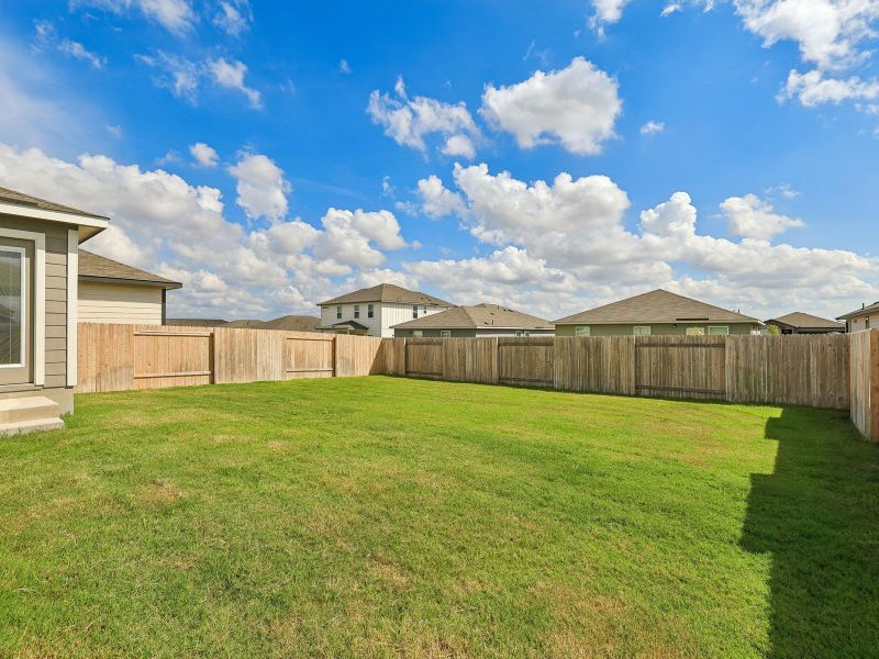 Exterior details and patio area of a home in Eastern Wells, Jarrell (Image 3).