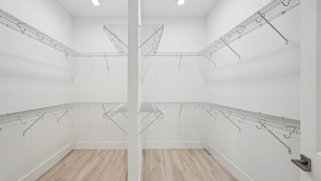 The Primary Walk-In Closet