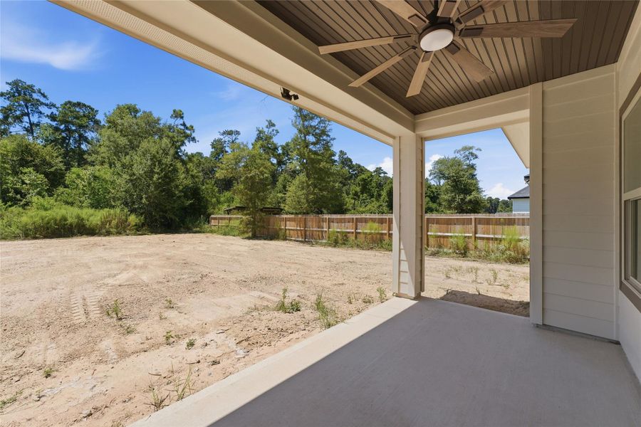 Exterior details and patio area of a home in , Huffman (Image 3).