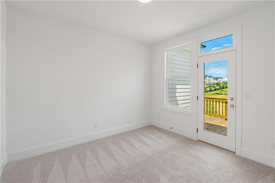 Spacious, unfurnished interior of a new home in Waterhaven, Cumming (Image 49).