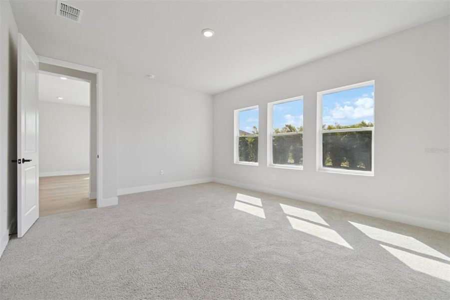 Spacious, unfurnished interior of a new home in Waterset Tradition Series, Apollo Beach (Image 25).