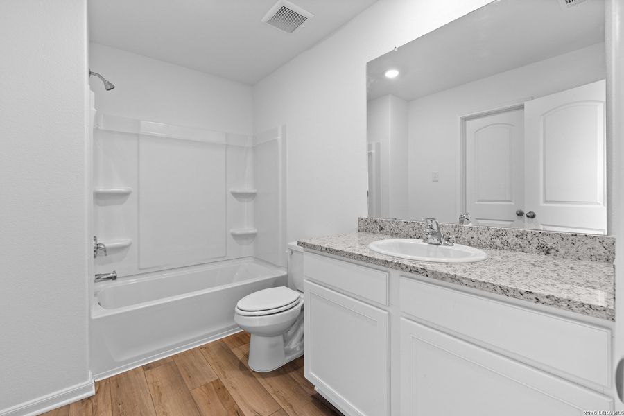 Furnished interior view inside a new home in Preserve at Medina, Von Ormy (Image 6).