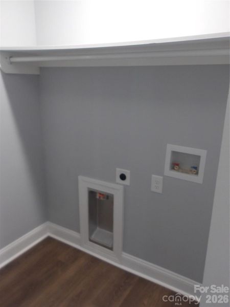 Laundry with built in shelf