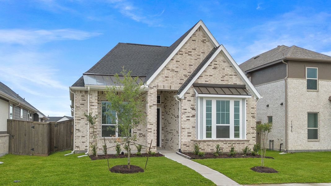 Representative exterior photo of a completed home built from the Augusta by Chesmar Homes in Riceland, Mont Belvieu, TX (Image 15). Representative exterior photo of a completed home built from the Augusta by Chesmar Homes in Riceland, Mont Belvieu, TX (Image 15).