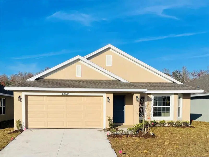 Front exterior of a new home in , Leesburg, FL, highlighting curb appeal (Image 2). Front exterior of a new home in , Leesburg, FL, highlighting curb appeal (Image 2).