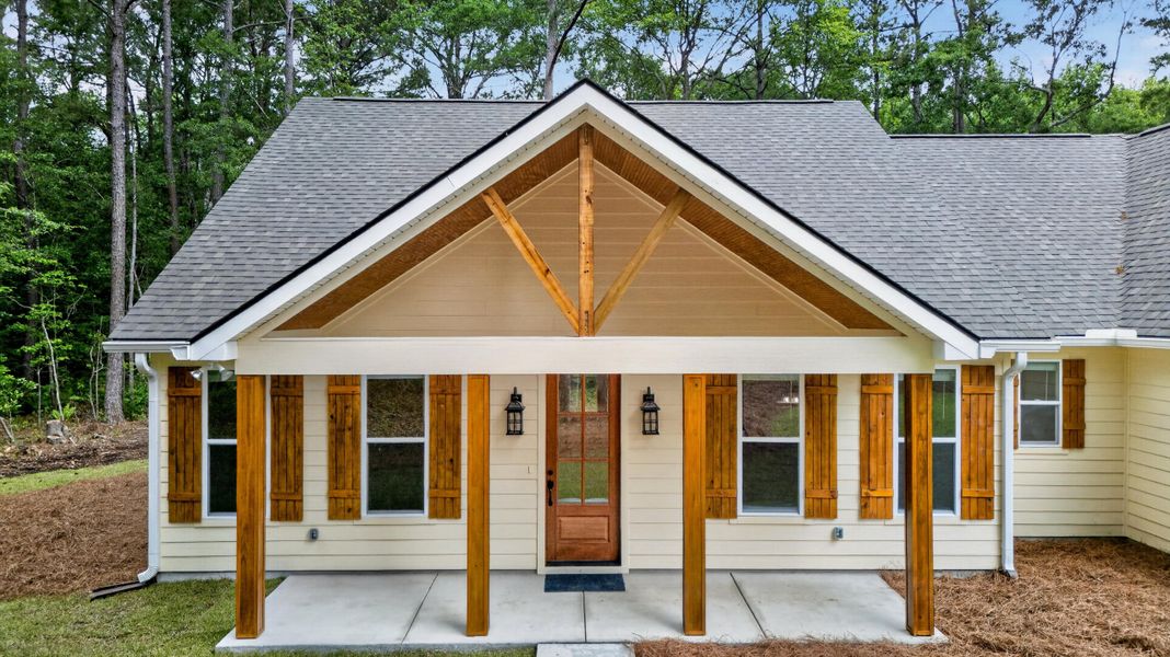 Exterior details and patio area of a home in , Johns Island (Image 27).