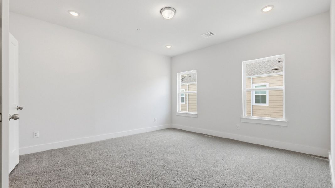 Furnished interior view inside a new home in Collin Creek, Plano (Image 38).
