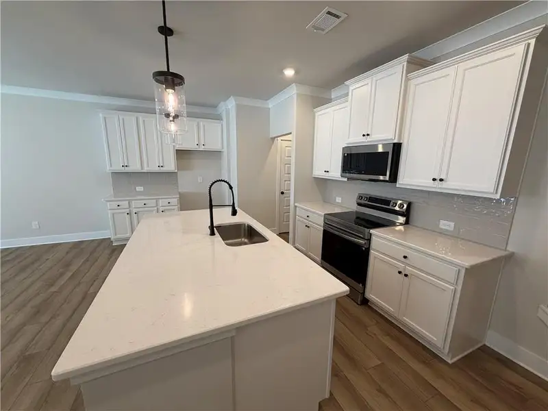 Furnished interior view inside a new home in Millstone at Mundy Mill, Gainesville (Image 8).