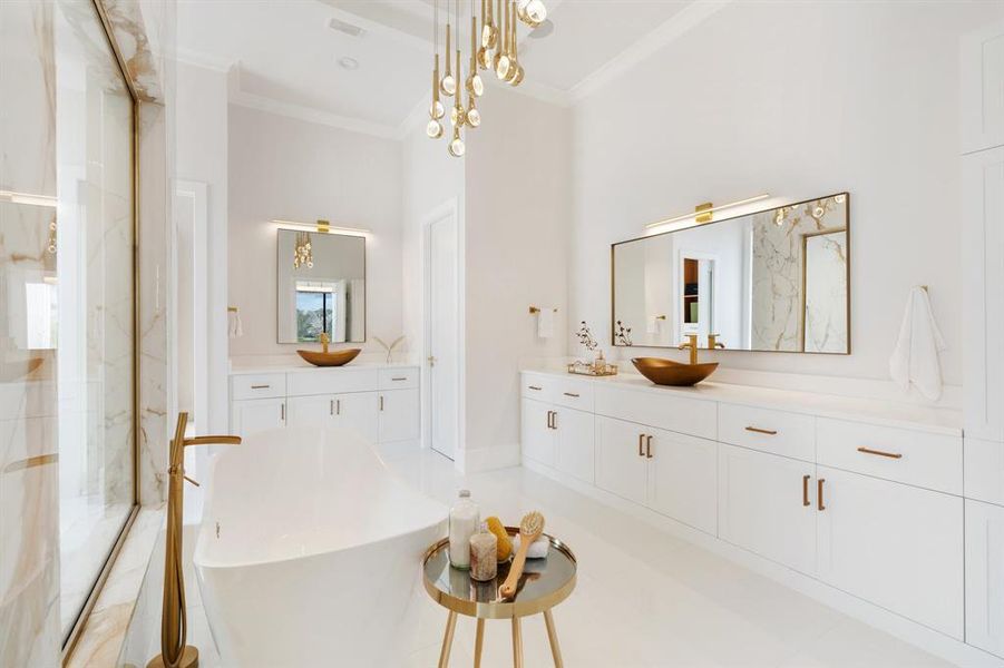 Indulge in the luxury of a resort-style bathroom with his-and-her vanities, a separate shower, and a lavish soaking tub for the ultimate relaxation experience.