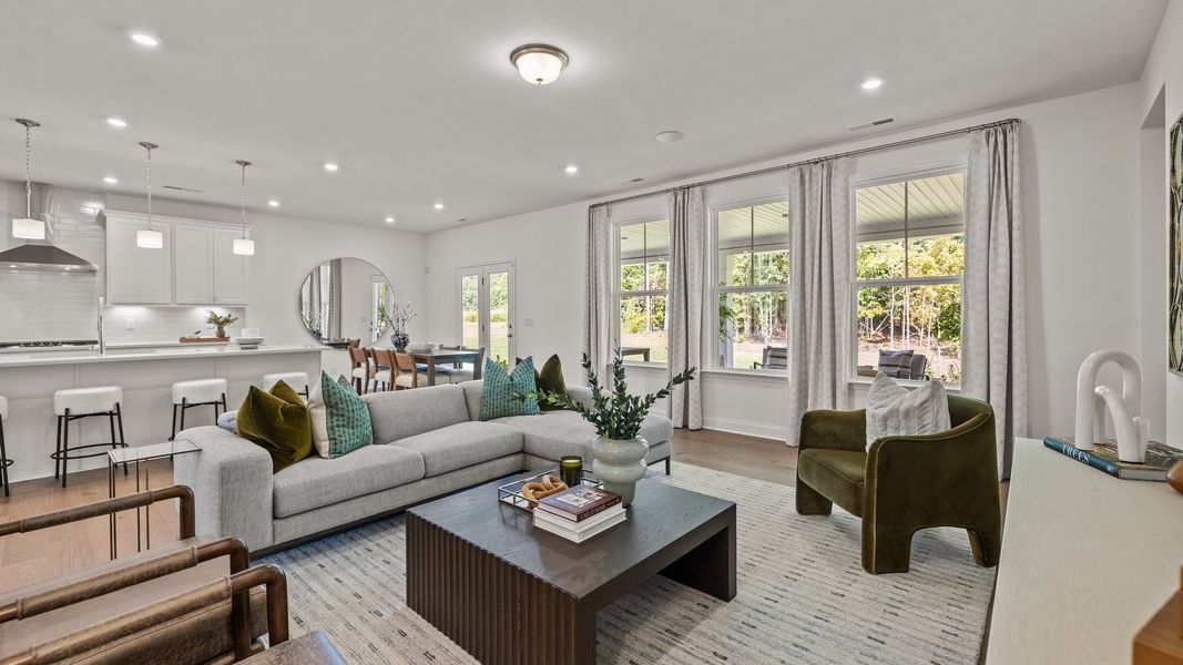 Open concept family room, gourmet kitchen, eat-in area, and elevated ceiling; The Townsend Design by DRB Homes in York, SC