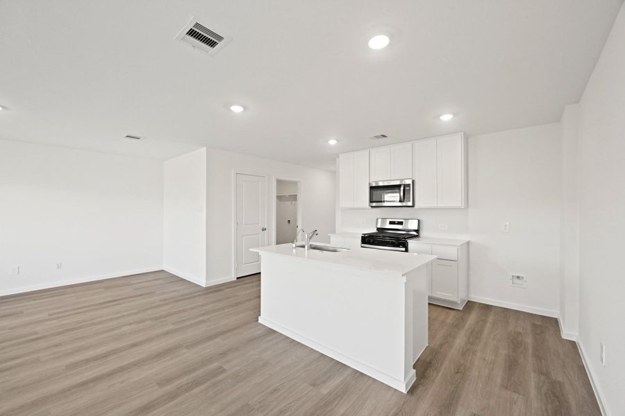 Furnished interior view inside a new home in The Canopies, Splendora (Image 5).
