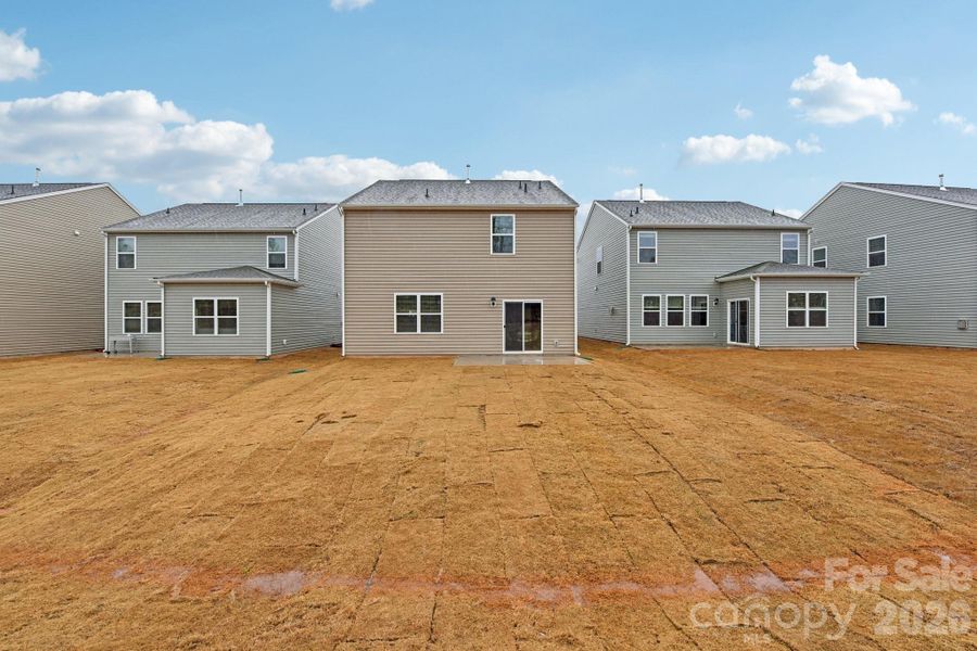 Exterior details and patio area of a home in The Hamptons at Hickory, Hickory (Image 3).