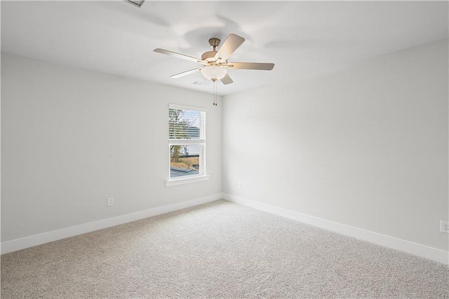 Spacious, unfurnished interior of a new home in Rose Creek, Cumming (Image 46).