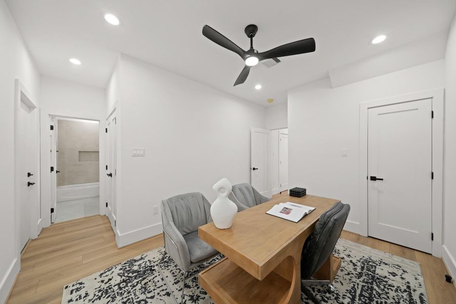 Perfect as a third bedroom, this space could easily serve as a study, home office or private guest suite. An additional closet with double doors sits just outside the bath plus, a door leading to the back allows access to the backyard.