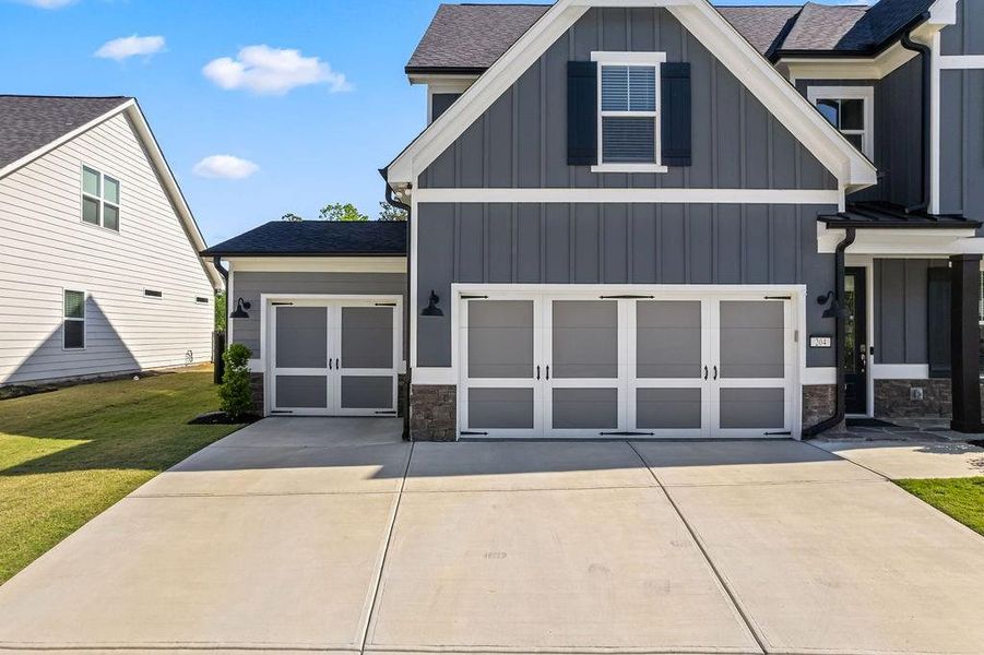 Front exterior of a new home in , Dallas, GA, highlighting curb appeal (Image 29).