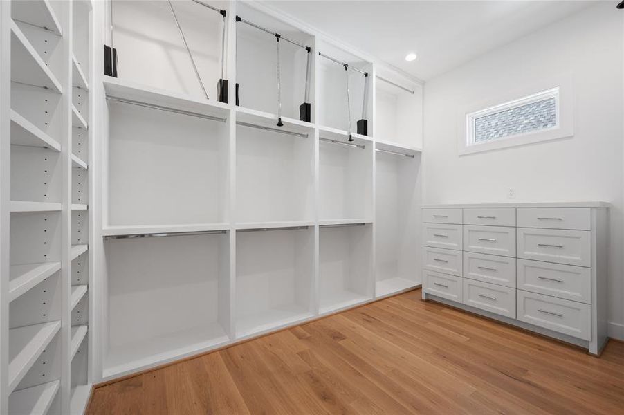 Huge primary closet with all custom built ins