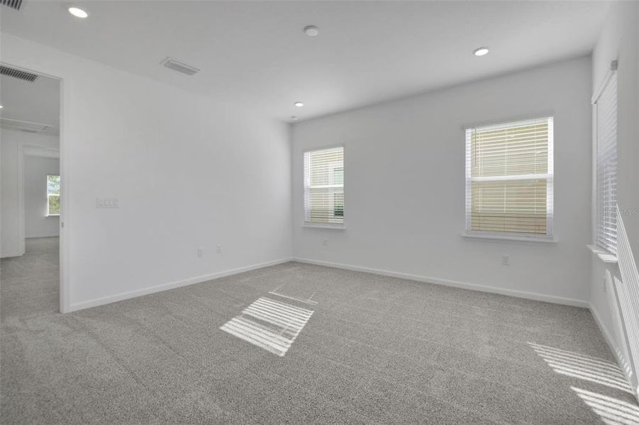 Spacious, unfurnished interior of a new home in Serenade at Ovation, Winter Garden (Image 31).