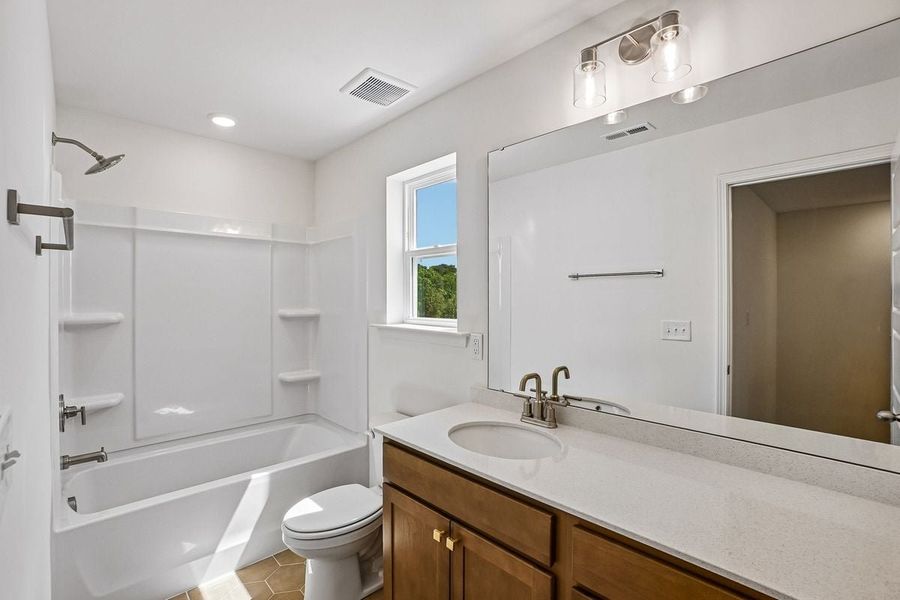 Furnished interior view inside a new home in Brooks Mill - Reserve Series, Durham (Image 4).